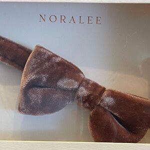 Noralee brown velvet bow tie, velcro closure in back. NWT